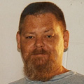 Glen Michael “Mike” Amos